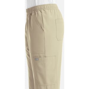A pair of men's full elastic joggers in light beige, featuring side pockets and a logo badge.