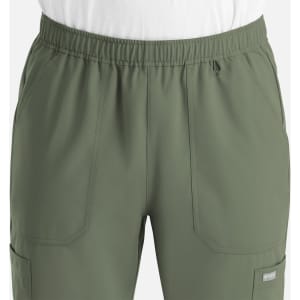 A pair of men's full elastic joggers in olive green with side pockets and a drawstring waistband.