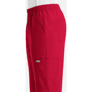 A pair of red men's joggers featuring full elastic waistband and side pockets. The joggers have a branding logo.