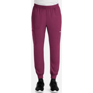 A pair of men's full elastic joggers in a deep burgundy colour, featuring side pockets and a waistband.