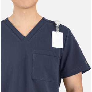A navy V-neck top for men featuring contrast piping and a shoulder attachment for a name badge.