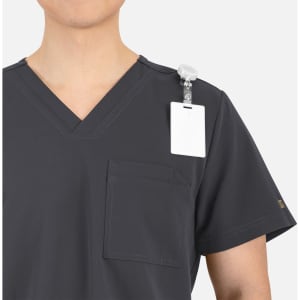 A men's grey V-neck top featuring contrast piping and a shoulder badge holder.