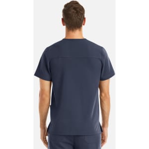 A navy blue men's V-neck top featuring three pockets and a sleek back design. It has a logo.