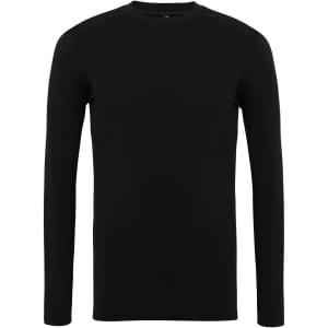 A long-sleeved black performance baselayer top with a simple design and branding on the tag.