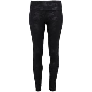 Full-length black leggings featuring a camouflage pattern and a branded logo on the waistband.