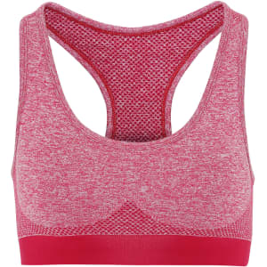 A red seamless sports bra with a textured design and wide shoulder straps, featuring a logo on the band.