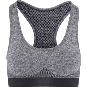 A grey sport bra featuring a seamless design and a mesh back, with a contrasting black band at the bottom.