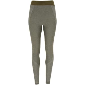 A pair of grey and olive green seamless leggings with a logo, designed for comfort and flexibility.