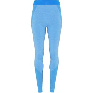 A pair of seamless sport leggings in light blue with darker blue accents and a waistband. Features a logo.