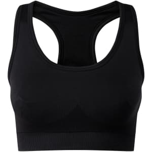 A black sports bra featuring a seamless design and a mesh racerback. It has a branding logo on the front.