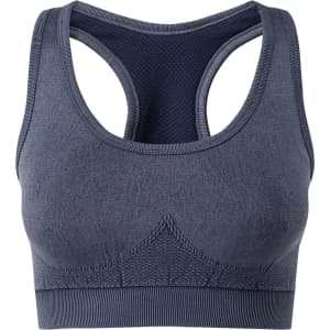 A seamless sport bra in dark blue with a sporty design and a branded logo on the band.