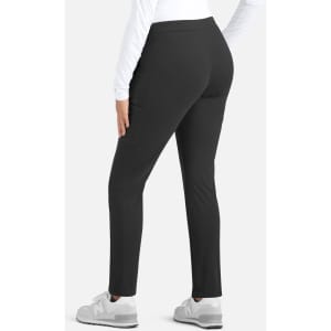 A pair of mid-rise tapered pants in black, featuring a fitted style and designed for women. The product has a logo.