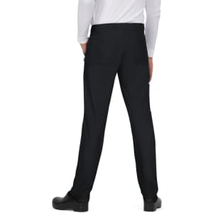 Black pants are shown from the back, featuring a relaxed fit and pockets, worn with a long-sleeved white shirt.