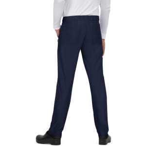 A pair of navy blue pants with an elastic waistband and pockets, viewed from the back.