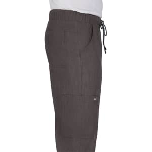 A pair of grey pant with a drawstring waist and pockets, featuring a subtle logo.