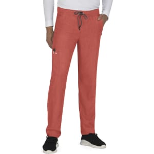 A pair of red pants with a drawstring and side pockets, showcased on a model wearing a long-sleeve top and sneakers.