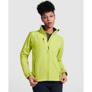 A bright lime green women's softshell jacket with a high collar and zipped pockets, featuring a logo.