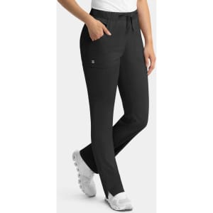 A pair of black cargo pants with a full elastic waistband, featuring pockets and worn with white footwear.