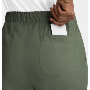 A pair of women's cargo pants in olive green, featuring a full elastic waistband and a rear pocket.
