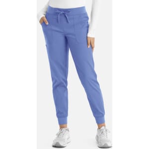 A pair of women's joggers in a light blue colour, featuring pockets and an elastic waistband.
