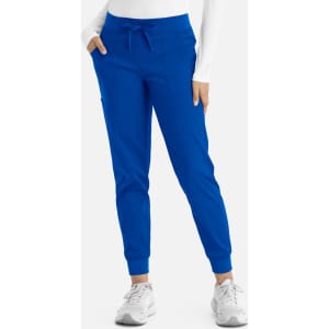 A pair of women's joggers in bright blue, featuring a drawstring waist and cuffed ankles. Includes side pockets.