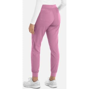 A pair of women's joggers in a soft pink colour with tapered cuffs and pockets, displayed from the back.