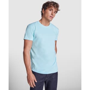 A light blue T-shirt featuring a fitted design, worn by a model against a plain background.
