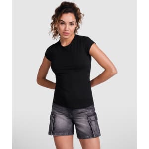 A black t-shirt with a fitted design, worn by a model. The image features plain styling and a subtle logo.