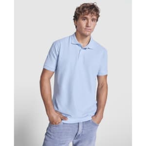 A man wearing a light blue polo shirt with a collar and short sleeves, featuring a logo.