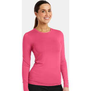 A fitted long-sleeve underscrub tee in bright pink with a logo present on the garment.