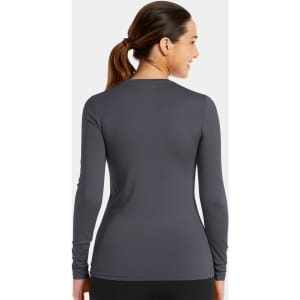 A fitted long-sleeve tee in dark grey with a smooth texture and rounded neckline, featuring a logo on the back.