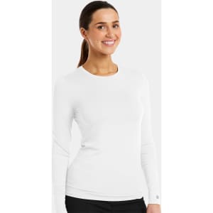 A white long-sleeve underscrub tee with a fitted design, featuring a small logo on the sleeve.
