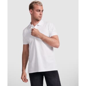 A white polo shirt with a collar, displayed on a model against a plain background. It features a logo on the chest.