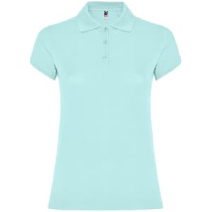 A women's polo shirt in a light aqua colour with a collared neck and short sleeves, featuring a brand logo.