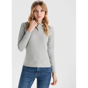 A grey long sleeve polo shirt for women, featuring a collar and a fitted design. Includes a logo.