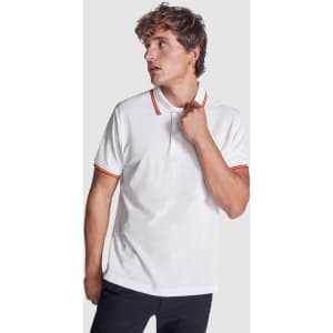 A white polo shirt featuring orange trim. The shirt has a collar and a logo on it.