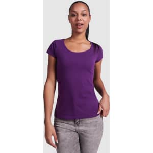 A purple t-shirt with short sleeves and a scoop neckline, modelled by a woman. It has a simple design and a fitted style.