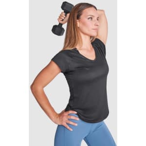 A black women's T-shirt with a V-neck, styled with a model holding a dumbbell, alongside blue leggings.