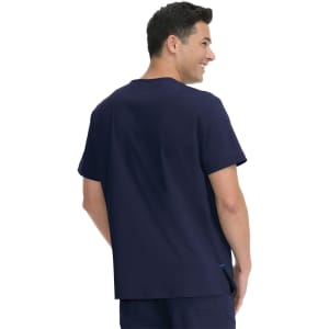 A navy blue men's scrub top with a relaxed fit and a logo on the back.