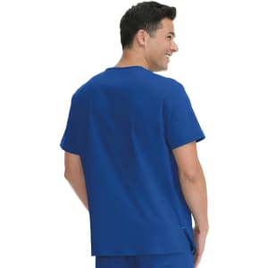 A blue short-sleeved top worn by a man, featuring a simple design and a round neckline. The top has a logo.