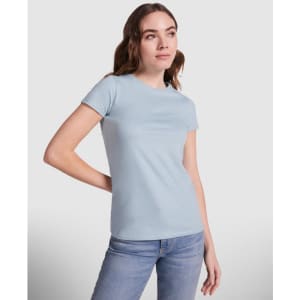A light blue Capri T-Shirt displayed on a model, featuring a fitted design and short sleeves.