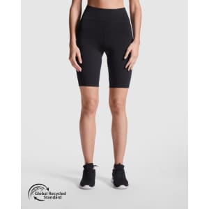 Black short leggings with a high waistband, shown on a model standing upright. Features a logo.