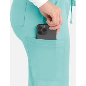 A pair of aqua women's cargo pants with a phone securely placed in the back pocket.
