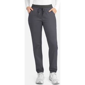 A pair of women's cargo pants in grey with a contrasting waistband and side pockets. The model has hands in pockets.