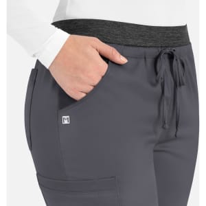 Grey cargo pants featuring a contrast black waistband and pockets, with a small logo on the side.