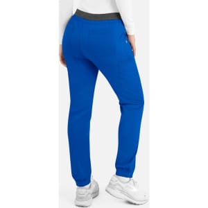 A pair of women's cargo pants in vibrant blue with a contrast waistband and side pockets. Features branding.