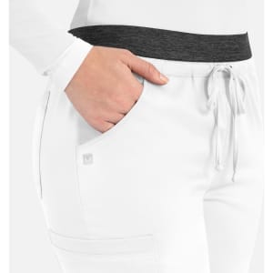 A pair of women's cargo pants in white with a dark grey waistband, featuring side pockets and a drawstring closure.