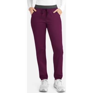 A pair of women's cargo pants in a deep plum colour with a contrasting grey waistband and pockets.