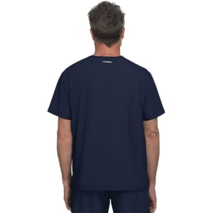 A navy blue t-shirt is displayed, featuring a simple design and a logo on the back. The model is facing away.