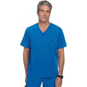 A blue medical scrub top with a v-neck design and a chest pocket. The model has grey hair and wears a watch.